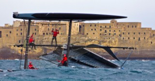 Naples (Italy), 11/04/2012  Americas Cup World Series Naples 2012  Artemis Racing nose dives and capsizes on Day 1