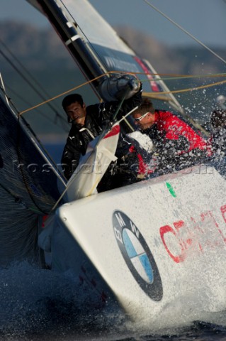 Emirates Team New Zealand leads Team Origin GBR at the final top mark rounding Louis Vuitton Trophy 