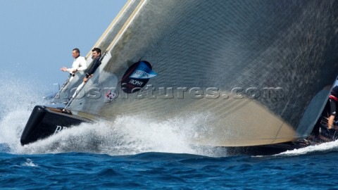 Emirates Team New Zealand and BMW Oracle Racing USA with a penalty to complete cross the start Louis