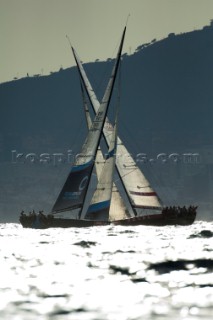 Team Origin (GBR) and Luna Rossa (ITA) cross in race six. Regatta Camper - Conde de Godó Trophy - Barcelona. 23/7/2010