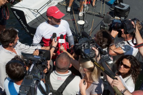 Paul Cayard is surrounded by media after Artemis win the Regata Camper  Conde de God Trophy  Barcelo