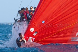 Emirates Team New Zealand bowman Richard Meacham gets the string line in position in the coastal race. Trofeo Caja Mediterraneo Region de Murcia, Audi medCup regatta. 28/8/2010