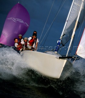 Melges sportsboat boat powers off wave