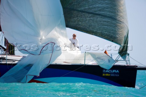 KEY WEST FLORIDA  January 16th 2007 Bowman retrieves spinnaker on Numbers IRC1 during racing on Day 