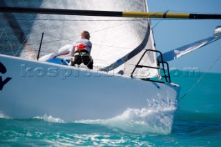 KEY WEST, FLORIDA - January 16th 2007: Bowman prepares to hoist the spinnaker during racing on Day 2 of Key West Race Week 2007 on January 16th 2007. Key West Race Week is the premier racing event in the winter season. (Photo by Sharon Green/Kos Picture Source)