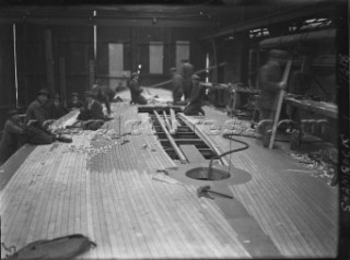 The original deck being built on the J-Class yacht Shamrock commissioned by Sir Thomas Lipton in 1930 at Camper and Nicholsons in Gosport, UK