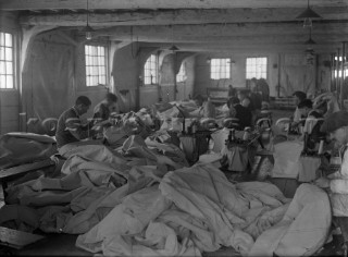 Hand sewing sails in Ratsey & Lapthorn Ltd on the south coast UK in 1930