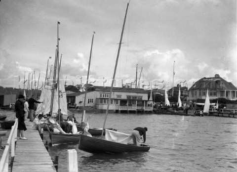 The 12ft one design N Class dinghy designed by Uffa Fox alongside the jetty during the Yachting Worl