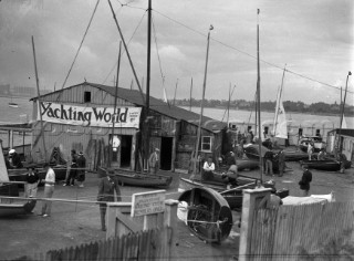 The 12ft one design N Class dinghy designed by Uffa Fox alongside the jetty during the Yachting World Parkstone Yacht Club regatta in 1936, UK