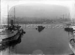 The J Class Shamrock V owned by Sir Thomas Lipton being taken out of the water onto a slipway at Whites Yacht Builders in Southampton (UK) in 1930