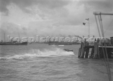 Powerboat racing off pier in the Solent