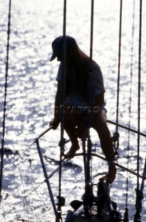 Girl relaxing on the bow of Swan 51 FORMOSA - the 1000th Swan built