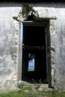 Broken down houses on Aitutaki Island, Cook Islands, South Pacific.