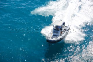 Man using a tender to the superyacht White Cloud