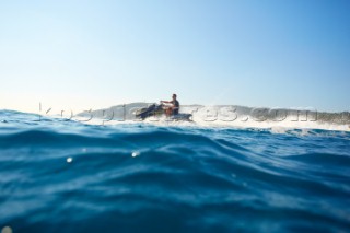 Man jet skiing in the mediterranean sea.