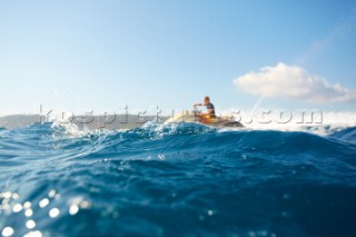 Man jet skiing in the mediterranean sea.