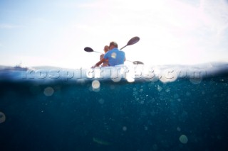 People kayaking in the mediterranean sea.