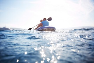 People kayaking in the mediterranean sea.