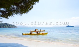 People kayaking in the mediterranean sea.