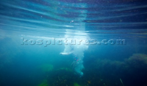 Girl jumping underwater