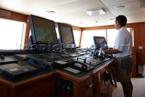 Captain on the bridge of a superyacht