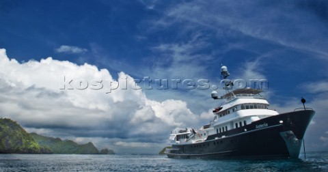 Cruising in Indonesia superyacht Asteria at anchor in Wagmab