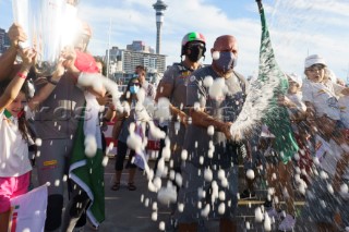 Champagne celebration. Prada crew celebrate winning the Prada Cup Challenger Series