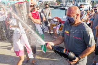 Prada crew celebrate winning the Prada Cup Challenger Series