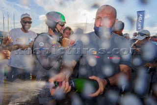 Prada crew celebrate winning the Prada Cup Challenger Series