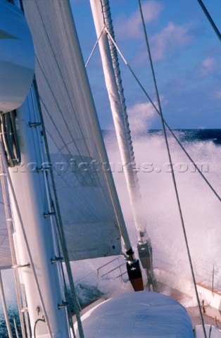 Bow wave of a superyacht crossing the Pacific Ocean