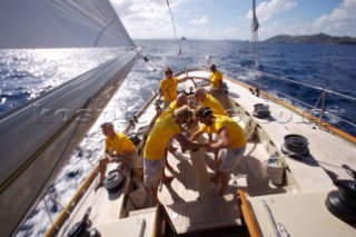 The crew onboard W-Class yacht Wild Horses work together during a race near Saint Bartholomew, French West Indies.