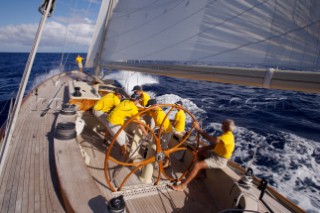 The crew onboard W-Class yacht Wild Horses work together during a race near Saint Bartholomew, French West Indies.