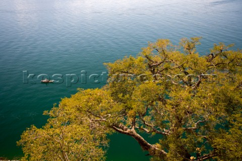 fisherman in dugout canoe Lake Atitlan Guatemala