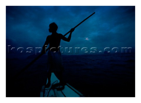 A fisherman travels home on sunset near the shores of El Nido situated at the top of the Palawan isl
