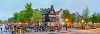 Corner of Prinsengracht and Blauwburgwal at night, Amsterdam, North Holland, Netherlands