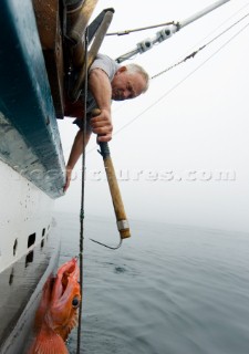 Sept 24, 2008   20 miles offshore of Morro Bay California.   Captain Bill Blue fishing for Black Gill Rock Fish off the coast of Big Sur California using the hook and line, or long-line method.  A new wave in sustainable commercial fishing is pushing fisherman to switch from higher impact methods of harvesting fish like trawling- to hook and line or long line harvest.