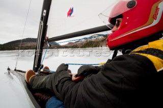 An ice boater sails on the frozen Eagle Lake on Mount Desert Island in Maine.