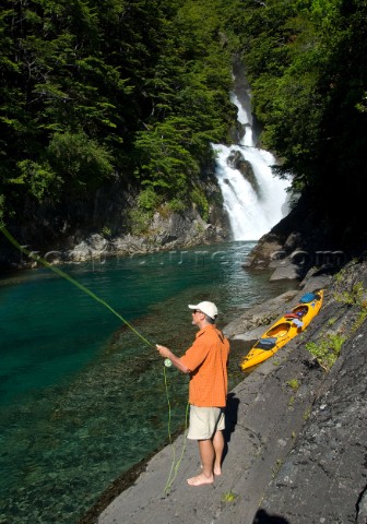 George Bahm enjoys fly fishing during a wilderness adventure in Futaleufu Chile