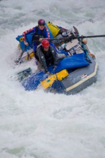 Emily Morgan (rowing) and Tanya Paliani on an inflatable raft at Lava Falls rapid, Grand Canyon, Arizona.