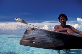 Bajau with speared fish. Sabah/Borneo/Malaysia.