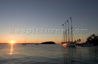 At sunrise the 151 foot, four masted Schooner Margaret Todd  that sails the islands of Frenchmans Bay. The only four masted schooner to work New England waters in over half a century, the Margaret Todd sails and carries tourist three times daily from the Bar Harbor Inn Pier. Jose Azel/Aurora Photos/Kos Pictures