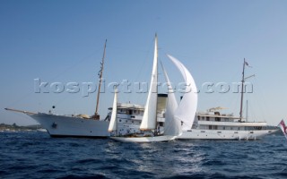 Argyll speeds away from Skylark under spinnaker as she heads for the rounding of Start/Finish yacht Talitha to take line honours of the Blue Bird Cup 2011.