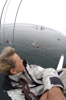 Kos up the mast of the committee boat at the start of the J Class yachts